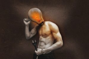 Man with naked torso and light bulb head